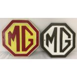 2 painted cast iron, octagonal shaped, MG wall plaques.