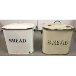 2 vintage enamel bread bins, one in green and cream colourway, the other white and blue.