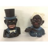 2 Black Americana cast iron money boxes with moving arm & rolling eyes action.
