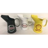 3 metal advertising oil jugs for: Castrol, Esso and Shell.