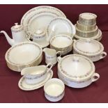 A quantity of Royal Albert Paragon tea and dinnerware in "Belinda" pattern.