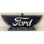A painted cast iron Ford "The Universal Car" wall hanging plaque, in blue and white.