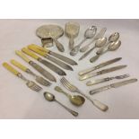 A quantity of antique silver and silver plate cutlery and vanity items.