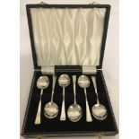 A cased set of silver teaspoons hallmarked Sheffield 1944 with Thomas Bradbury& Sons makers mark.