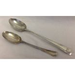 2 George III Irish silver serving spoons.