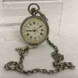 A ladies Swiss silver pocket watch with highly engraved case and white metal albert chain.