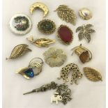 A small quantity of vintage brooches to include stone set and animal themed.