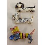 3 costume jewellery enamelled and stone set brooches in the shape of Dachshund dogs.