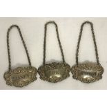 A set of 3 vintage, silver, decanter bottle labels on chains; Brandy, Sherry and Port.