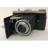 A rare Kershaw Curlew III folding camera with Taylor Hobson lens.