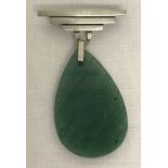An Art Deco silver and jade drop brooch. Back of brooch marked sterling silver.