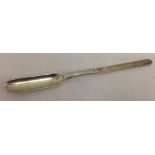 A Victorian, Irish silver, marrow scoop spoon with fish motif to reverse of bowl.