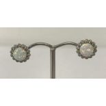A pair of opal and cubic zirconia stud earrings marked 925.