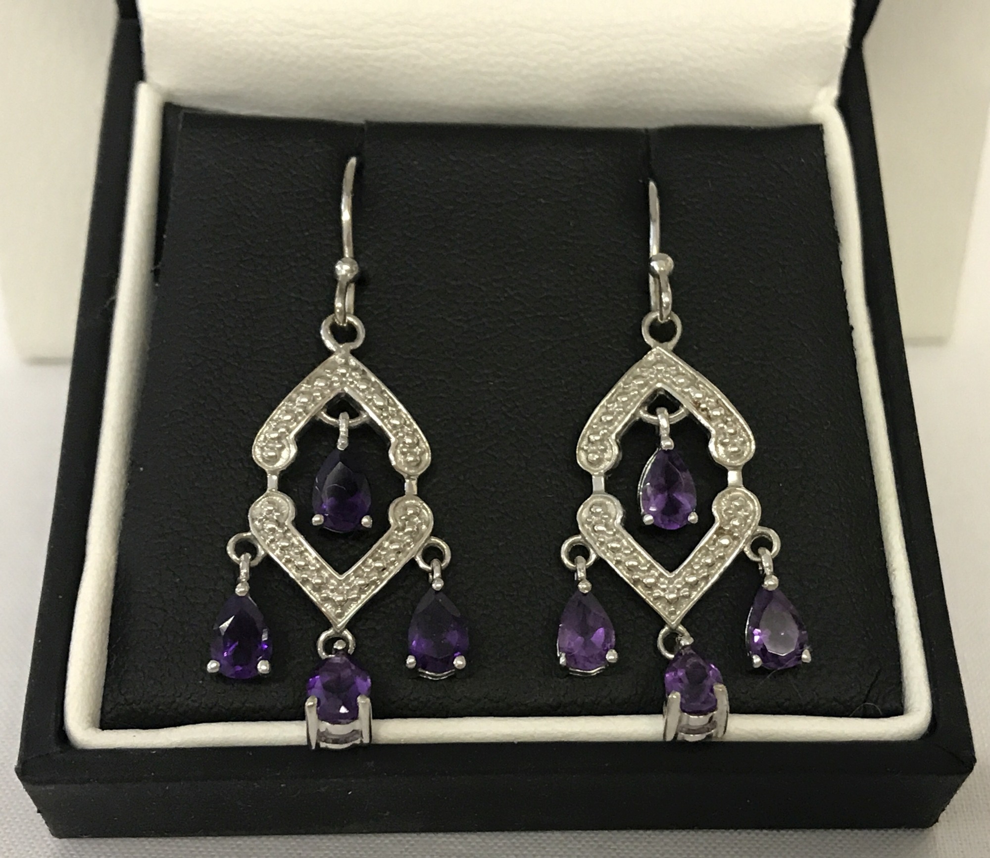 A pair of 925 silver and amethyst drop earrings by The Genuine Gem Company.