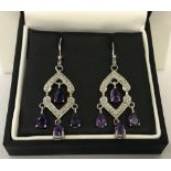 A pair of 925 silver and amethyst drop earrings by The Genuine Gem Company.