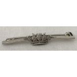 A Naval themed silver sweetheart bar brooch featuring ships sails and flags in the shape of a crown.