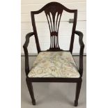 A modern mahogany coloured regency style carver chair with spade feet and wheatsheath detail to back