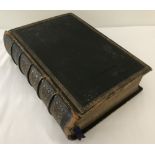 A large antique leather bound bible printed for John Davies & Co by George Wilson 1809.