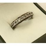 A vintage 9ct gold full eternity ring set with clear stones.