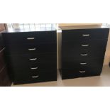 A pair of modern 5 drawer chests in black finish with metal handles.