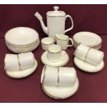 A quantity of first quality Royal Doulton "Gold Concord" bone china coffee ware H5049.
