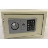 An unused Safewell Electronic safe complete with instructions, fixing kit and override key.