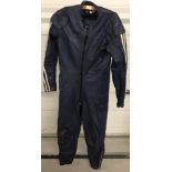 A vintage blue leather all-in-one racing suit with white stripe detail to arms.