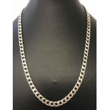 A heavy 18 inch silver curb chain.