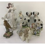 A collection of assorted ceramic and resin figurines to include Regency Fine Arts.