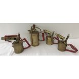 3 vintage brass blow lamps together with a vintage brass sprayer.