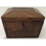 A Victorian mahogany sarcophagus shaped box with feather edged inlaid banding and canted lid.