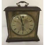 A vintage wooden, brass and marble effect Metamec mantle clock.