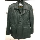 A vintage ladies green soft leather coat by Buades.