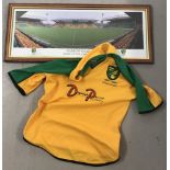 A Norwich City green & yellow centenary t shirt, size YL, signed to back.