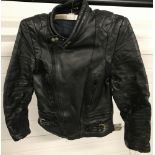 A vintage black leather "Taille" bikers jacket.