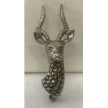 A vintage silver brooch in the shape of a stags head set with marcasite's.