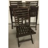 4 matching Cedarwood rustic fold-up patio chairs.