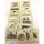 A quantity of 106 collectable Post Office issue commemorative stamp postcards.