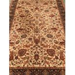 A large Persian style wool rug with animal and floral detail.