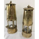 2 vintage brass miners safety lamps with name plates.