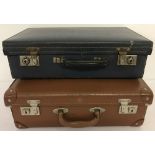 2 small vintage suitcases.