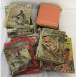 A collection of vintage children's books and annuals.