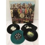 Sgt. Peppers Lonely Hearts Club band (PCS 7027) , vinyl LP with gatefold sleeve by the Beatles.