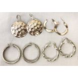 4 pairs of ladies earrings.