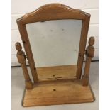 A modern pine free standing, swivel dressing table mirror.