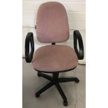 A modern swivel office chair with tilt action.