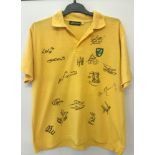 A Norwich City FC 2009 yellow polo shirt signed by 15 squad members.