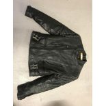 A vintage Sportex padded black leather bikers jacket.