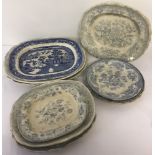 12 vintage blue and white meat and serving plates.