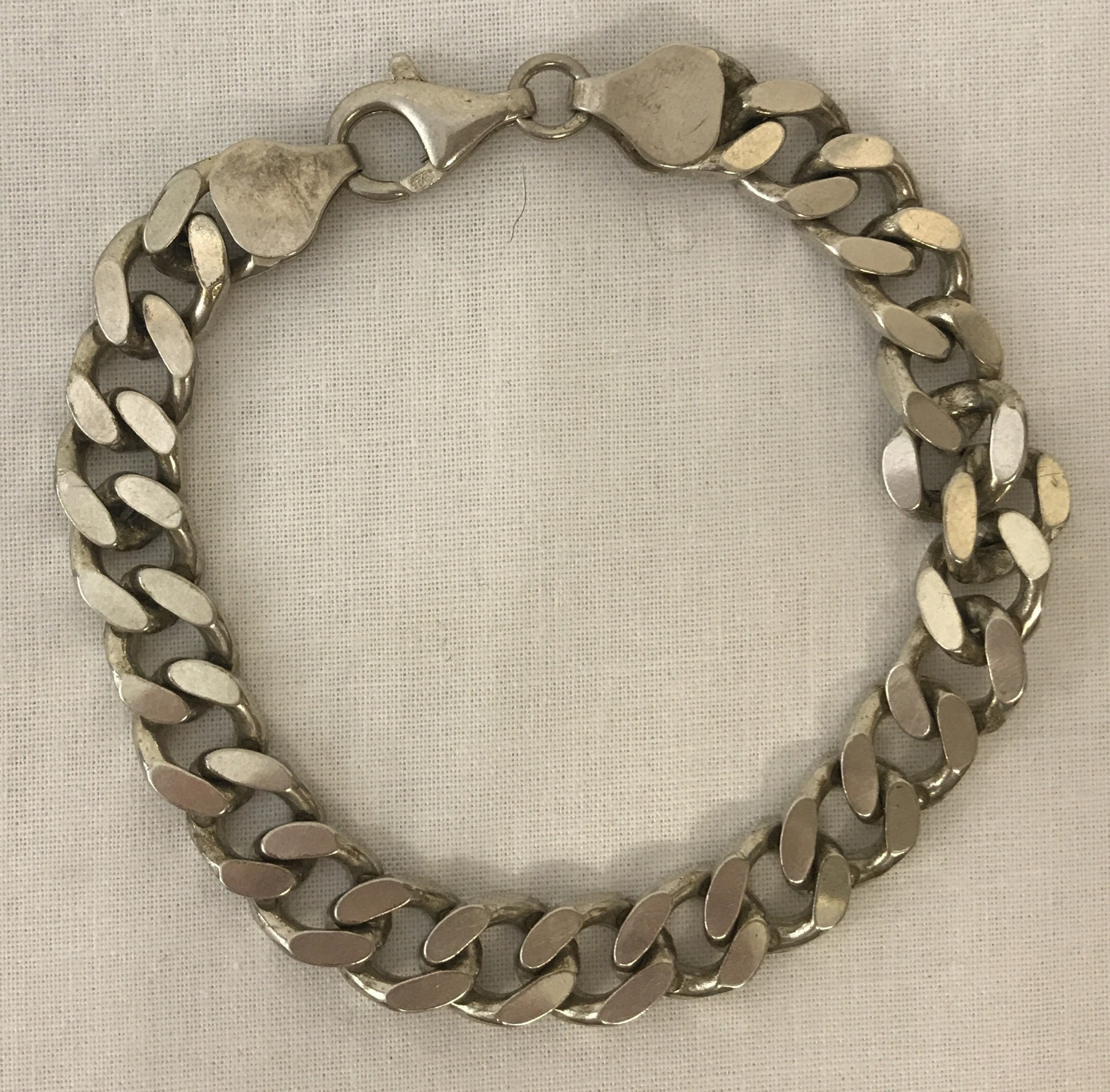 A heavy curb style chain bracelet.